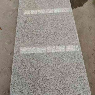 佛山芝麻白光面毛板